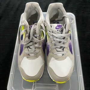 Nike Gray and Purple Athletic Shoes with Yellow Highlights